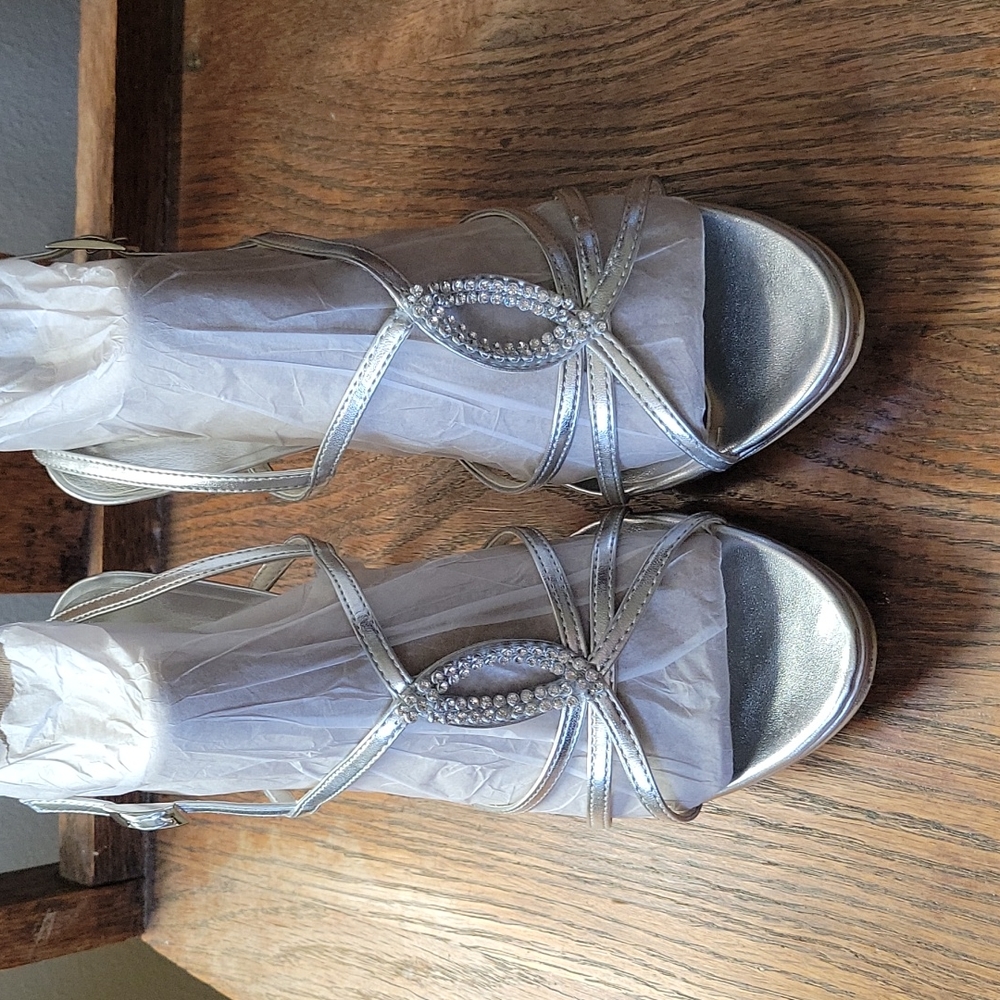 Womens silver stiletto heals.